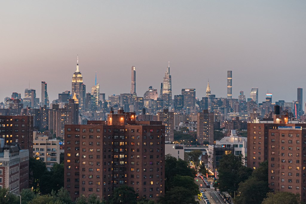a view of the nyc skyline at night